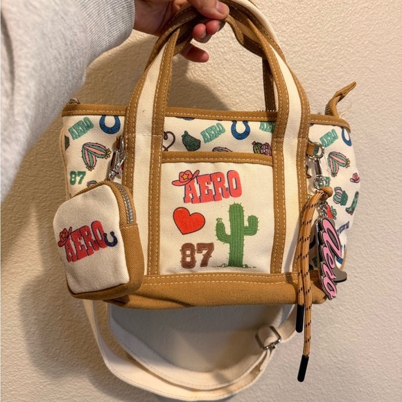 Aeropostale Handbags - Aeropostale Tan and Cream Tote with Graphics